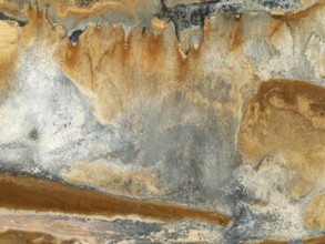 Abstract saline patterns at the edge of the Walvis Bay salt works. Aerial view. Drone shot. Namibia