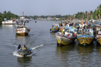 Fishing boats in Negombo river harbor, Sri Lanka