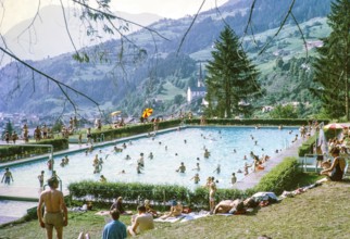 Crowded swimming pool on sunny summer day Oetz, Imst district, Tyrol, Austria, Europe, 1970