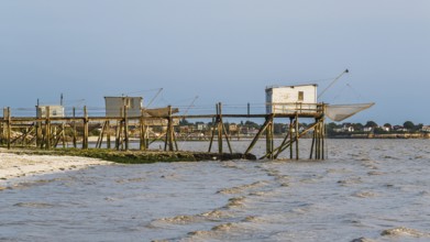 Fishing huts over Randonnee entre Histoire et Nature from a drone, Fouras, Fouras-les-Bains,