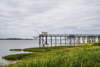 Fishing huts over Randonnee entre Histoire et Nature from a drone, Fouras, Fouras-les-Bains,