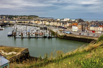 Panoramic view of a harbour and a town from a grassy hill, The harbour of Dieppe in Normandy,