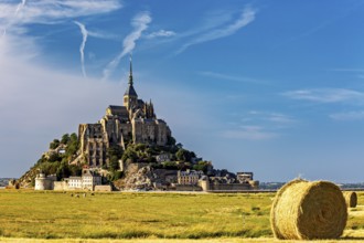 Imposing view of Mont Saint-Michel with a bale of straw in the foreground, Mont Saint Michel in