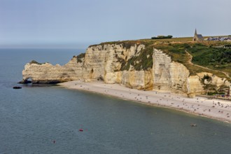 Imposing cliffs with a church at the top and a quiet beach by the sea, The cliffs and alabaster