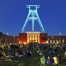 People in front of the German Mining Museum for the Extra Shift at night, Bochum, Ruhr Area, North