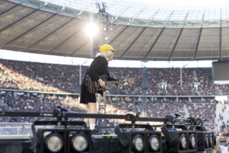 Angus Young, lead guitarist of AC/DC live on Power Up Tour 2025 at the Olympiastadion Berlin on 30