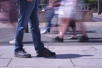Passers-by in a summer city, shopping, Germany