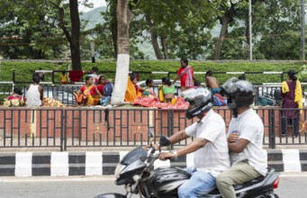 Devotees staying in street divider as they arrives to visit Kamakhya Temple during Ambubachi Mela,