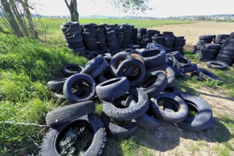 Old tyres in the landscape, car tyres