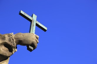 Detail of hand with cross, St John of Nepomuk on the Old Main Bridge, Würzburg, Lower Franconia,
