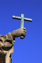 Detail of hand with cross, St John of Nepomuk on the Old Main Bridge, Würzburg, Lower Franconia,