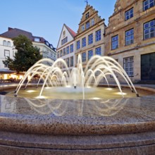 Old market with fountain and town houses in the evening, Bielefeld, East Westphalia-Lippe, North