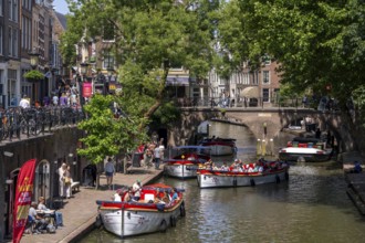 The old town centre of Utrecht, Oudegracht, around 2 km long with many old houses, shops,
