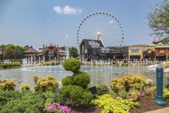 The Wheel ferris wheel behind the Ole Smoky Moonshine store at The Island recreation center in