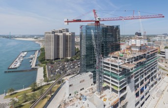 Detroit, Michigan - Construction of the 25-story JW Marriott Detroit Water Square hotel. The