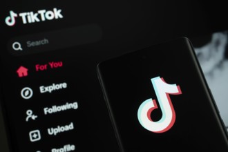 Dhaka, Bangladesh - 18 March 2025: The logo of the tiktok is displayed on a smartphone screen, and