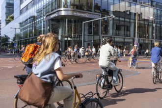 Central cycle path along the Vredenburg, in the city centre of Utrecht, lanes for pedestrians,