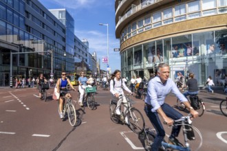 Central cycle path along the Vredenburg, in the city centre of Utrecht, lanes for pedestrians,