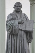 Luther monument with Bible and New Testament, Martin Luther, inscription, hands, carry, open, open,