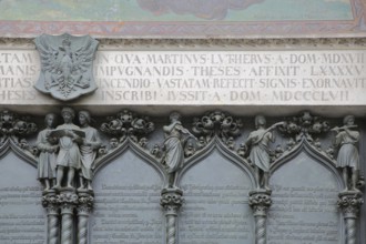 Detail of the theses door with inscription Martin Luther, church door, UNESCO, castle church,