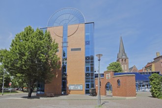 Modern town hall and tower of the Protestant church, Bitterfeld, Saxony-Anhalt, Germany