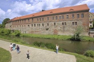 New Residence built in 1531 with bank of the millrace, pedestrian, photograph, Renaissance, Halle
