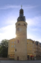 Historic Leipzig Tower built in the 15th century in backlight, sunbeams, former watchtower and part