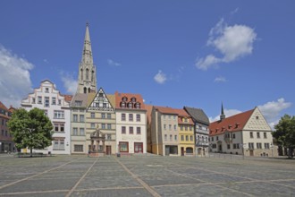 Market square with historic houses, old town hall and steeple of St Maximi's Church, Merseburg,