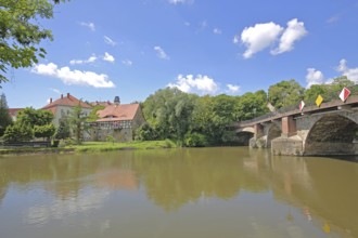Neumarkt Bridge over the Saale and historic half-timbered house Neumarktmühle, stone arch bridge,