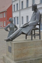 Monument to philosopher Friedrich Nietzsche, bronze sculpture, modern art, standing female figure,