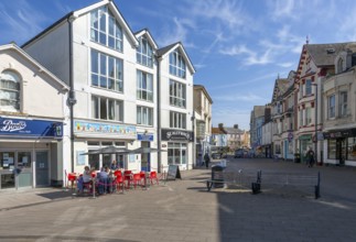 Pedestrianised street and shops, Triangle Park, town centre of Teignmouth, south Devon, England, UK