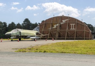McDonnell Douglas F-4 Phantom II outside hangar at former RAF Bentwaters base, Suffolk, England, UK