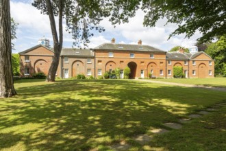 Stable block buildings converted to residential use, Sudbourne Hall, Suffolk, England, UK