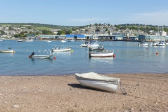 Small boats in harbour at Back Beach, Teignmouth, south Devon, England, UK