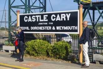Railway station platform sign Castle Cary junction for Yeovil Dorchester and Weymouth, Somerset,