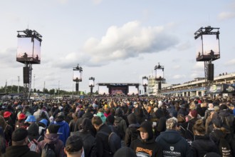 Festival visitors in front of the Utopia Stage at the Rock am Ring Festival on Sunday, Nürburgring