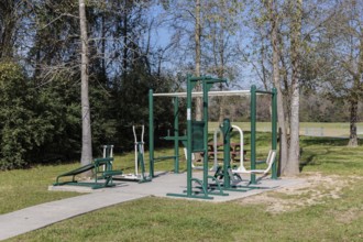 Outdoor fitness equipment in Cypress Creek Park at Timber Lane in Spring, Texas, USA