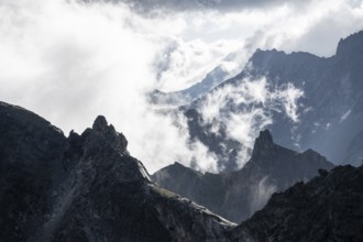 Rocky mountains, ridges with clouds, Valais Alps, Valais, Switzerland