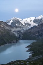 Mountain landscape with turquoise blue reservoir Lac des Dix and summit Mont Blanc de Cheilon,