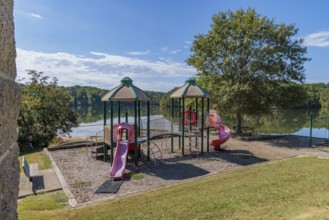 Playground and swimming area in the Pin Oak Campground at Natchez Trace State Park near