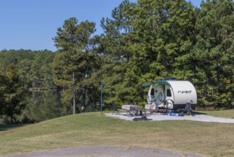 R-pod camper set up in camp site at the Pin Oak Campground in Natchez Trace State Park near