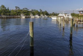 Sailboat and fishing boats in the private marina at the Grand Hotel in Point Clear, Alabama