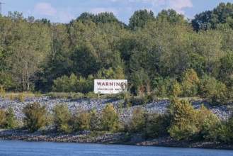 Sign warns of dangerous waters along the Tennessee River west of the Pickwick dam and locks near