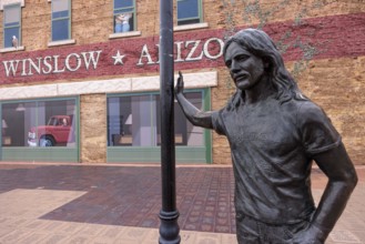 Statue of a man Standin' on a Corner in Winslow Arizona as sung in the classic Glenn Frey and
