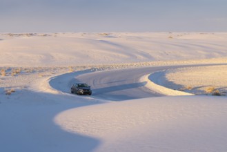 Cleared roads through the white gypsum dunes at White Sands National Park in Alamogordo, New