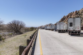 Semi trucks lined up at the Texas Canyon Rest Area on i-10 West near Dragoon, Arizona