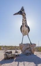 Giant Recycled Roadrunner statue made entirely from discarded materials by artist Olin Calk at an