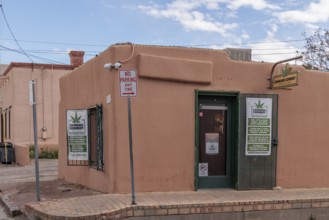Pueblo style adobe architecture of a commercial cannabis dispensary in Mesilla, New Mexico