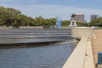 Bronze sculpture of Sam Houston behind the Mary Gibbs and Jesse H. Jones Reflection Pool at Hermann