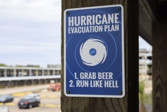 Humorous sign provides hurricane evacuation steps